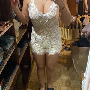Fashion nova lace romper in a size s.